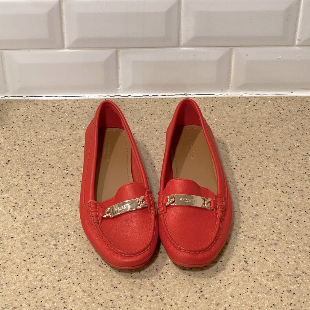 COACH: coral penny loafers